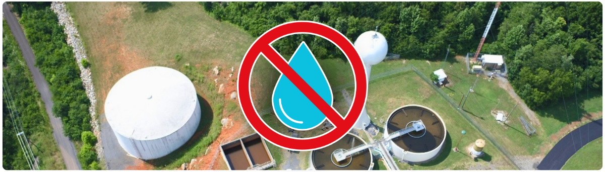 Background of a water plant with a water outage image in the forefront